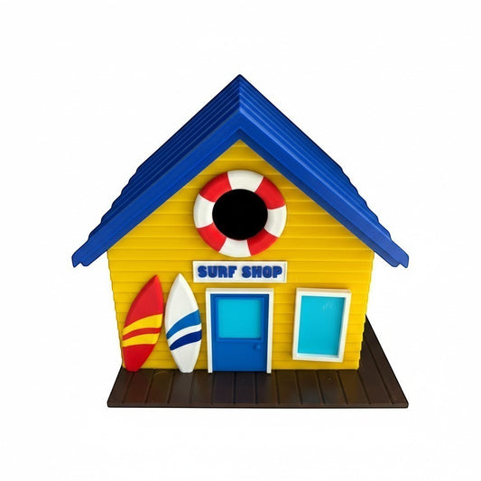 TL3D Prints yellow surf shop birdhouse with blue roof, surfboards, and lifebuoy detail. Functional outdoor decor.