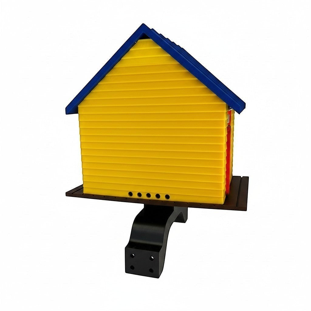 TL3D Prints yellow 3D printed surf shop birdhouse with blue roof and red door detail, functional outdoor decor.